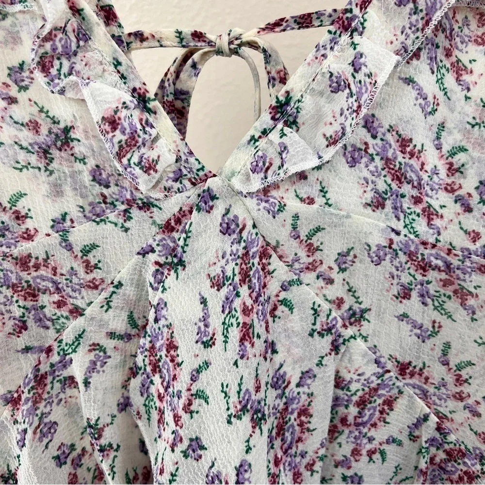 NASTY GAL FLORAL RUFFLE PLAYSUIT. NWT. Ruffle straps end in deep V-neck. Size 10 - Picture 3 of 13